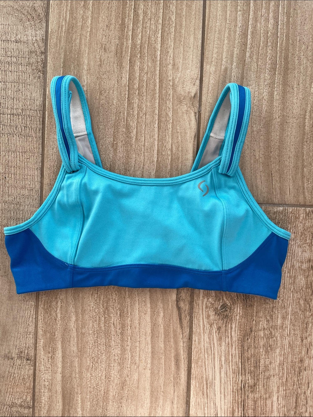 Moving Comfort aqua and royal blue Fiona sports bra, size 34B